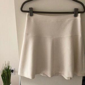 Lined cream circle mini skirt